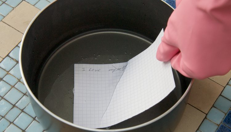 как удалить чернила с бумаги